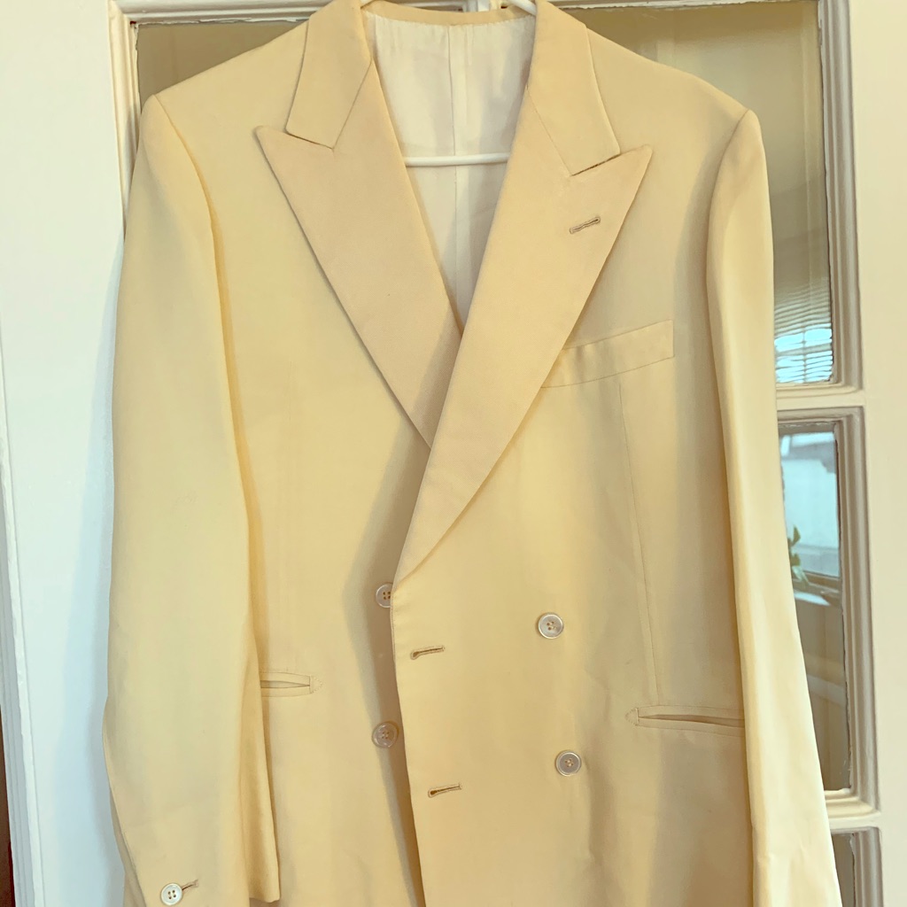 Cream Jacket And Black Pants Smoking